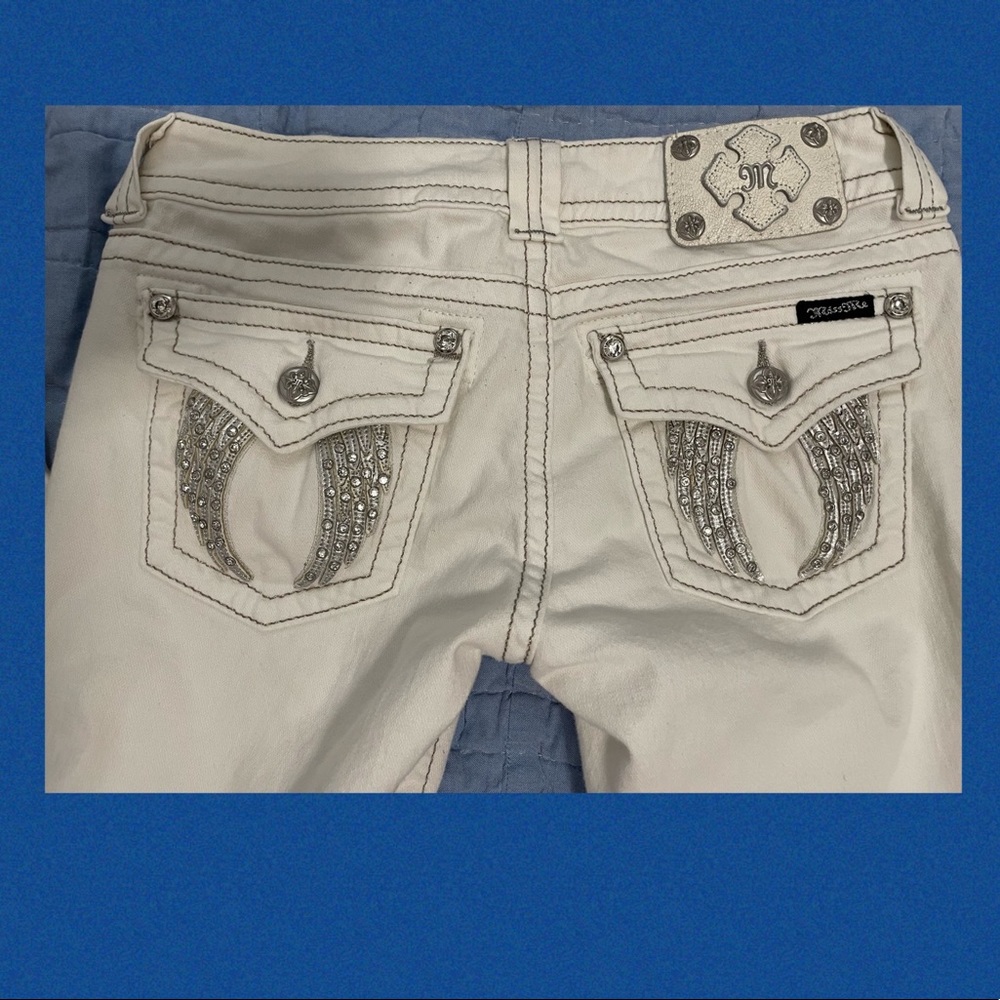 Ivory angel wing miss me jeans.